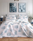 Blue and white toile de Jouy duvet cover set on bed in elegant bedroom