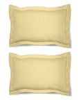 Une paire de taies d'oreiller Oxford 100 % coton uni, bordure de 5 cm.