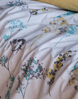 Provance floral duvet cover set with yellow, blue, and grey flowers on white fabric