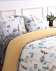 Floral duvet cover set with matching pillowcases on a modern bed, light and airy bedroom decor