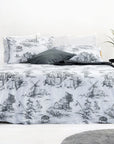 Grey toile de Jouy duvet cover set with scenic countryside print on a modern bed