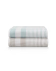 Stacked white and teal striped peshtemal towels on a plain white background