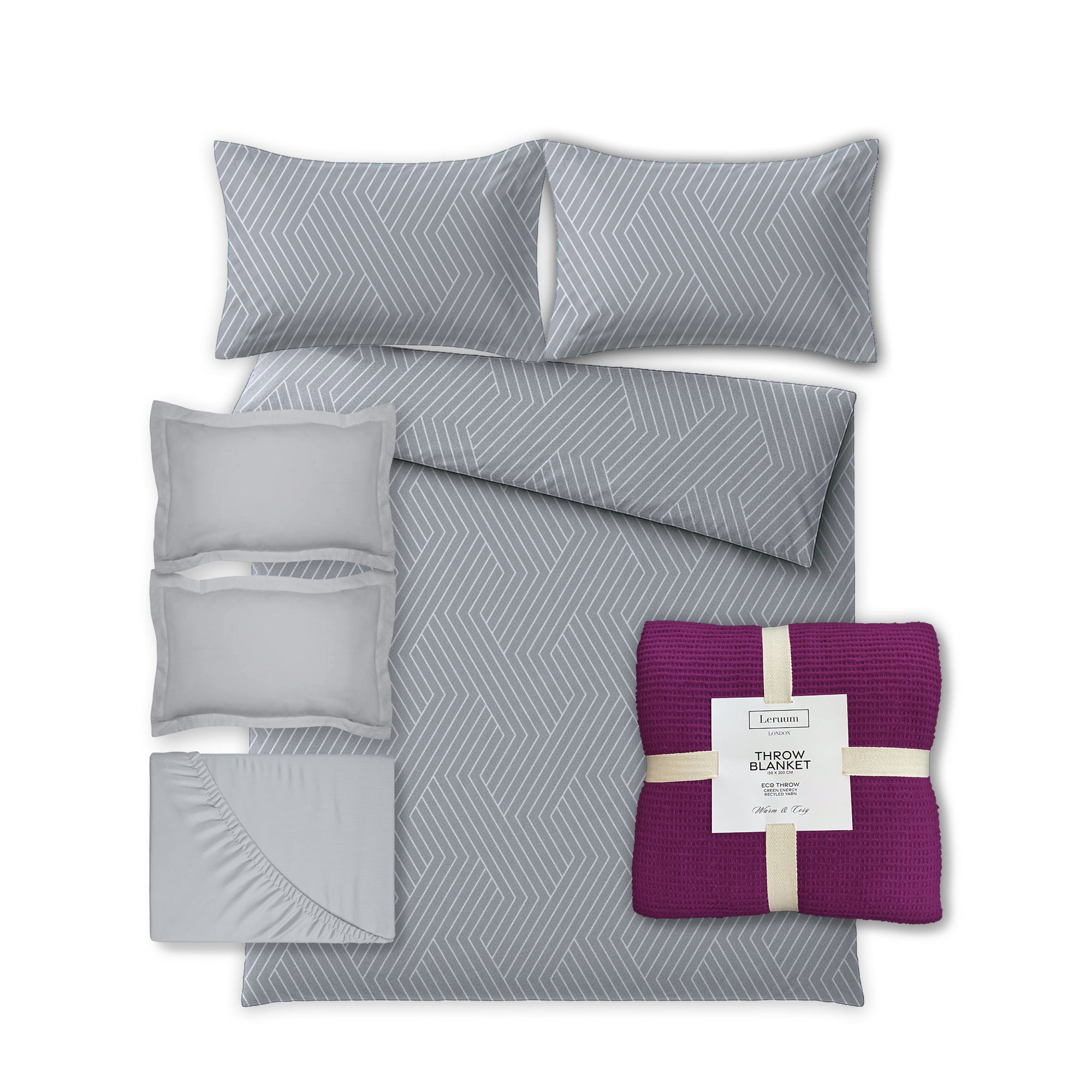 Grey bedding set with patterned pillows and a purple throw blanket on a white background