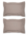 Une paire de taies d'oreiller Oxford 100 % coton uni, bordure de 5 cm.