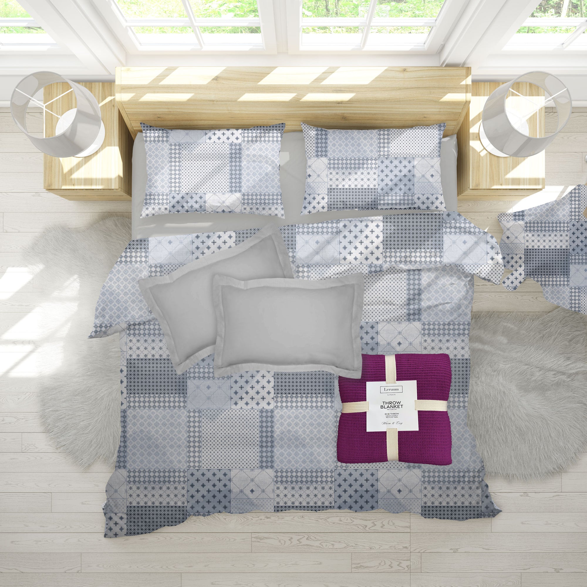 Gray and white checkered duvet set with a purple square on a bed in a bright room.