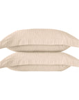Une paire de taies d'oreiller Oxford en satin de coton 100 % à rayures crème