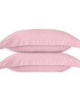 Une paire de taies d'oreiller Oxford en satin de coton 100 % à rayures blush